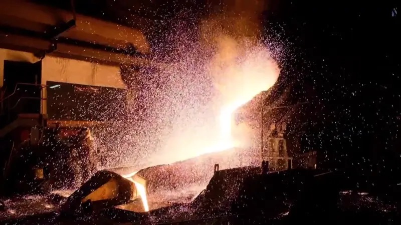 Molten metal pouring from the G.A. Rittenhouse furnace